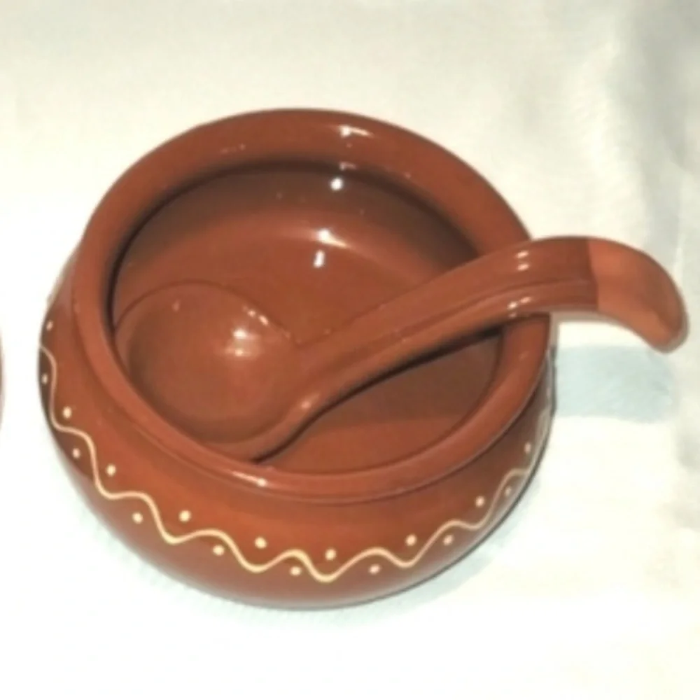 Sur la Table Glazed Terracotta bowl and a spoon
